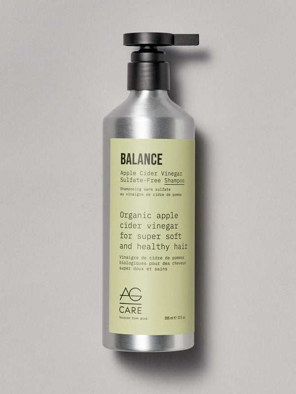 Pastel green label shampoo with apple cider vinegar and argan oil from an eco-friendly salon in Toronto, plant-based formula
