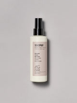 Beige label beach spray to create waves and boost volume from an eco-friendly salon in Toronto, with seaweed extracts