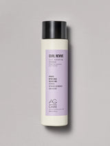 Pastel lavender label curl activating shampoo with coconut oil and pea peptides from an eco-friendly salon in Toronto, sulfate-free