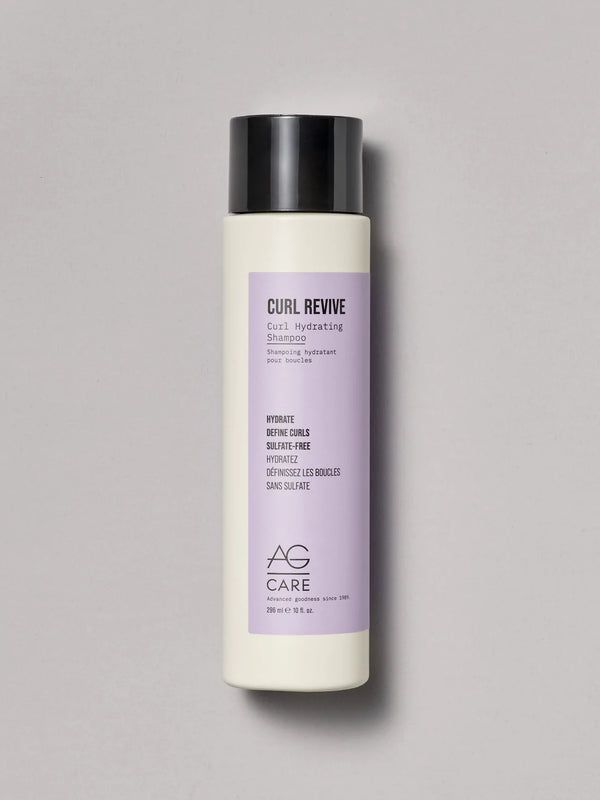 Pastel lavender label curl activating shampoo with coconut oil and pea peptides from an eco-friendly salon in Toronto, sulfate-free