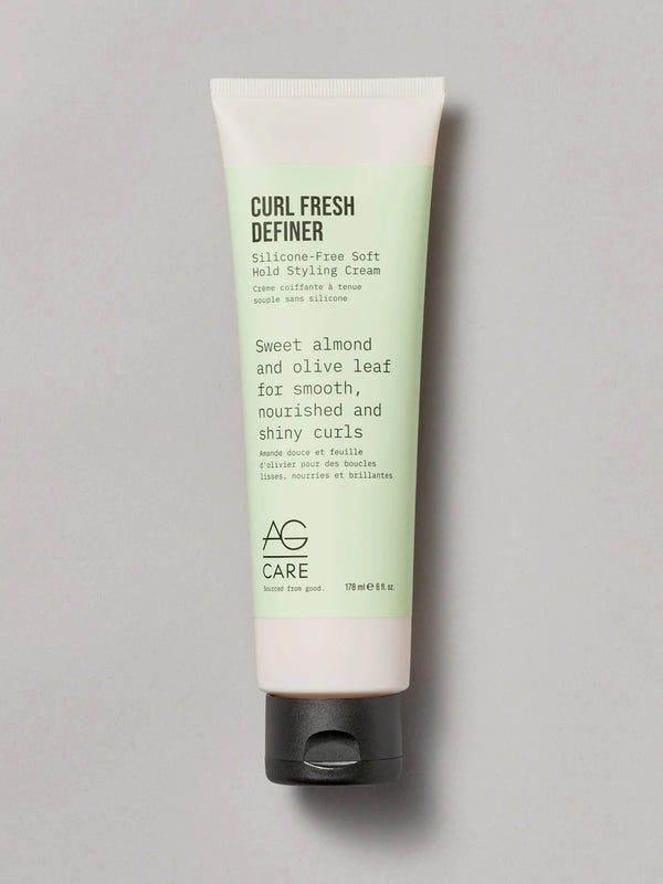 "Light pastel green label curl cream with sweet almond and olive leaf from an eco-friendly salon in Toronto for shine