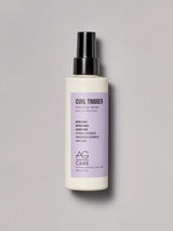 Light pastel lavender label curl spray to define and refresh curls from an eco-friendly salon in Toronto, alcohol-free