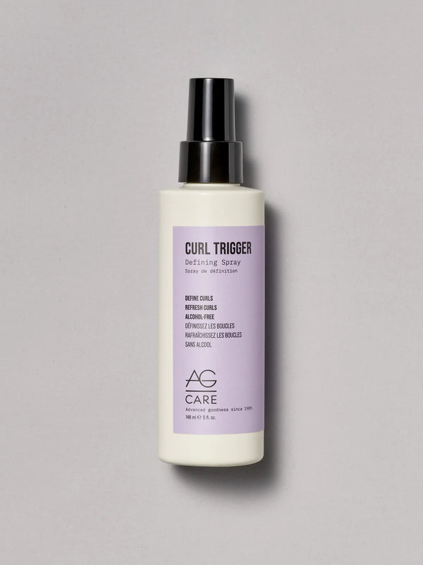 Light pastel lavender label curl spray to define and refresh curls from an eco-friendly salon in Toronto, alcohol-free