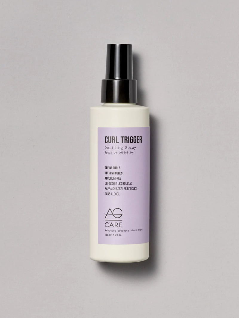 Light pastel lavender label curl spray to define and refresh curls from an eco-friendly salon in Toronto, alcohol-free