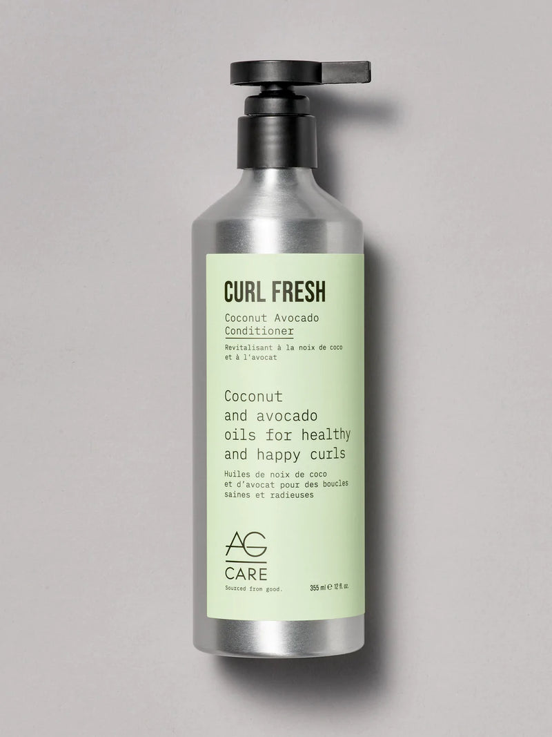 Pastel green label conditioner with coconut and avocado oils to define and strengthen curls from an eco-friendly salon in Toronto