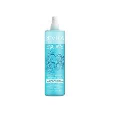 Blue liquid detangling conditioner spray with nourishing oils and antioxidants from an eco-friendly salon in Toronto