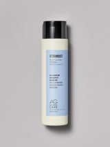 Pastel blue label hydrating shampoo with herbs and hyaluronic acid to seal moisture and add elasticity from an eco-friendly salon in Toronto
