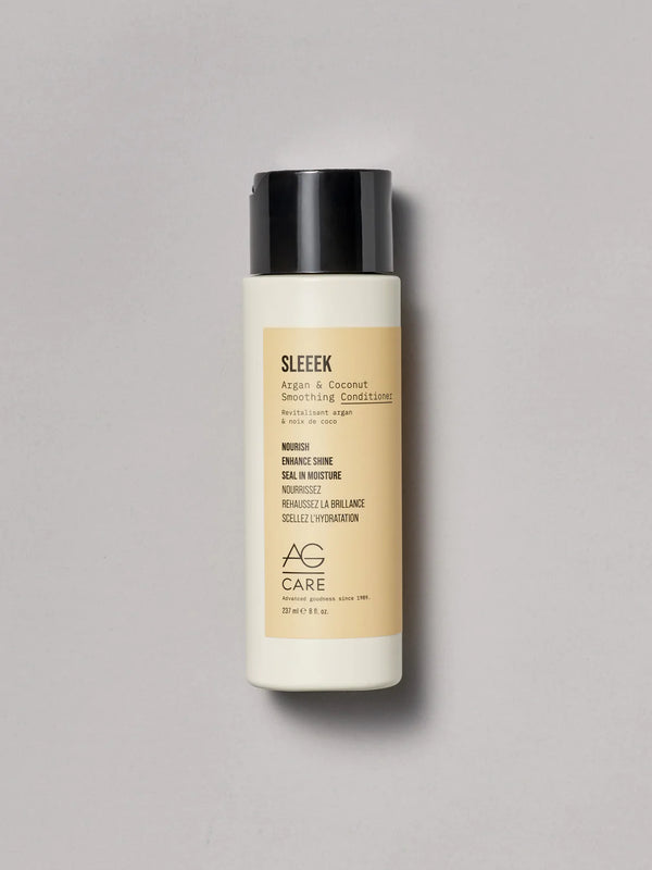 Pastel yellow label conditioner with coconut and argan oil to nourish and add shine from an eco-friendly salon in Toronto