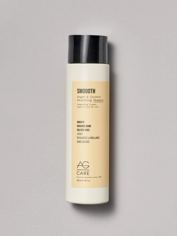 Pastel yellow label smoothing shampoo with coconut and argan oil to enhance shine from an eco-friendly salon in Toronto