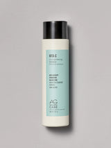 Pastel teal label strengthening shampoo with vitamin C and squalane from an eco-friendly salon in Toronto, sulfate-free