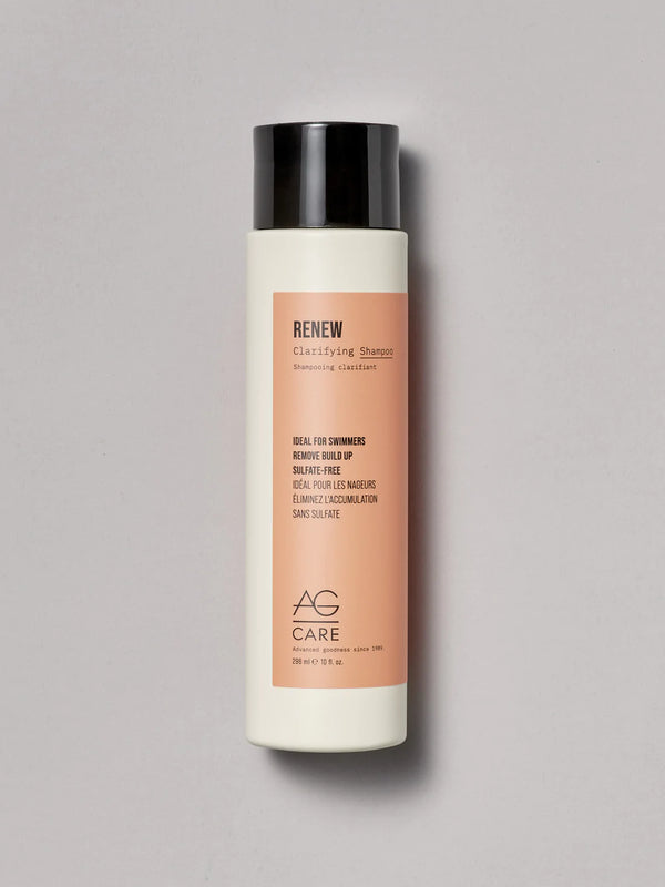 Pastel orange label revitalizing shampoo to remove build-up and chlorine, ideal for swimmers from an eco-friendly salon in Toronto