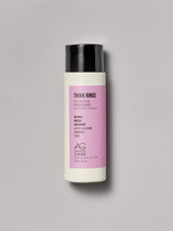 Pastel pink label volumizing conditioner with panthenol and pea sprout extract from an eco-friendly salon in Toronto