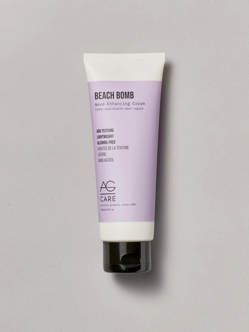 Bottle with pastel lavender label, AG Beach Wave Cream at Green Circle Salon Toronto. Adds texture to curls and waves, lightweight and alcohol-free.