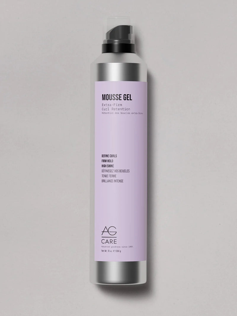 Silver can with light lavender label, AG Curl Mousse at Green Circle Salon Toronto. Firm hold mousse defines curls with shine and frizz control.
