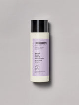 Bottle with pastel lavender label, AG Curl Lotion at Green Circle Salon Toronto. Defines curls with shine, humidity resistance, and no alcohol.