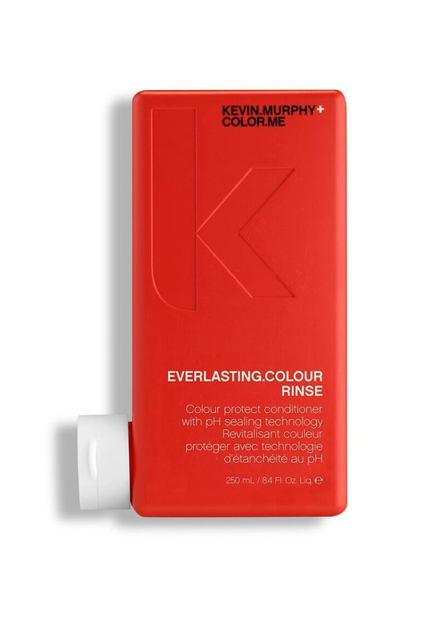 A bottle of Kevin Murphy Everlasting Colour Rinse conditioner with a sleek blood orange rectangle bottle, designed for colour protection and hydration