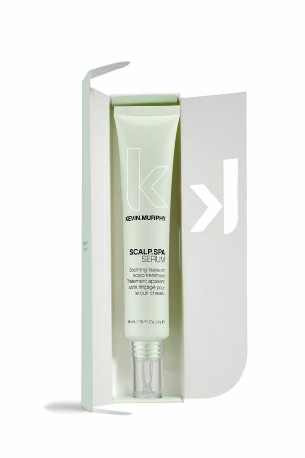 A pastel green tube of Kevin Murphy Scalp Spa Serum, a lightweight leave-in treatment for soothing and nourishing the scalp