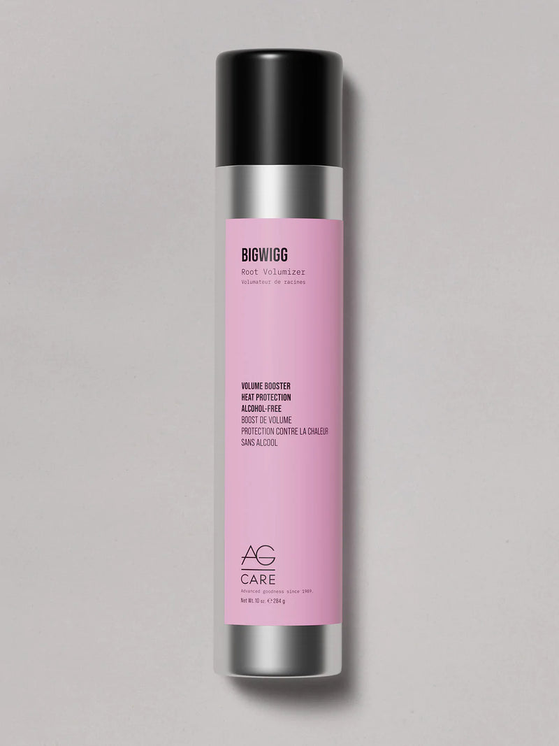 Silver long can with pink label, AG Root Volumizer Spray at Green Circle Salon Toronto. Boosts volume, protects from heat, and supports hair growth.