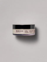 AG styling cream in plastic container at Green Circle Salon Toronto. Adds texture, polished shine, and long-lasting hold.
