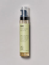 Clear bottle with pastel green label, AG Volumizing Mousse at Green Circle Salon Toronto. Adds volume, texture, and shine with sugar cane extract.