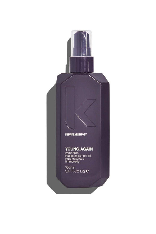 Dark purple YOUNG.AGAIN by Kevin Murphy at Green Circle Salon Toronto. Leave-in oil for shine, repair, and heat protection.
